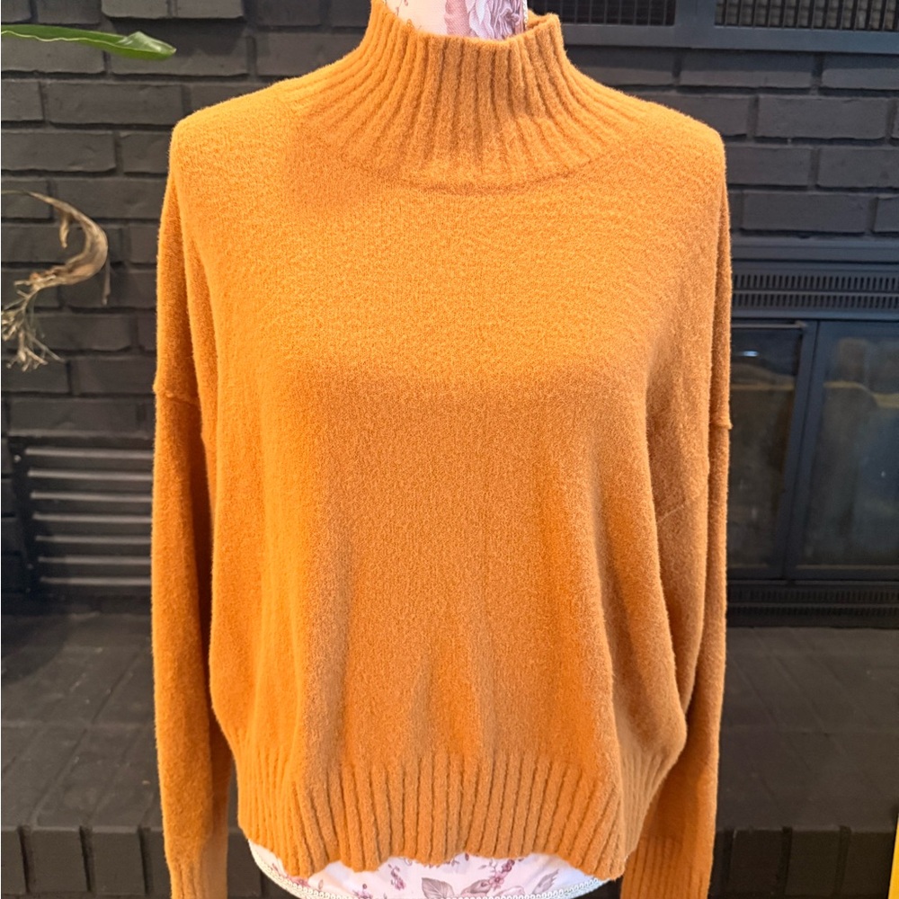 Free People Cozy High-Rib Mock Neck Sweater in Mustard Orange